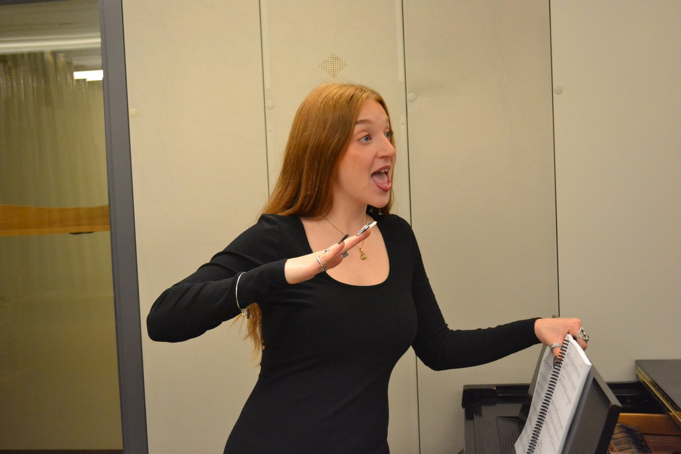 Ana Santiago demonstrating vocal technique during a lesson at Quarter Bend Voice Lessons