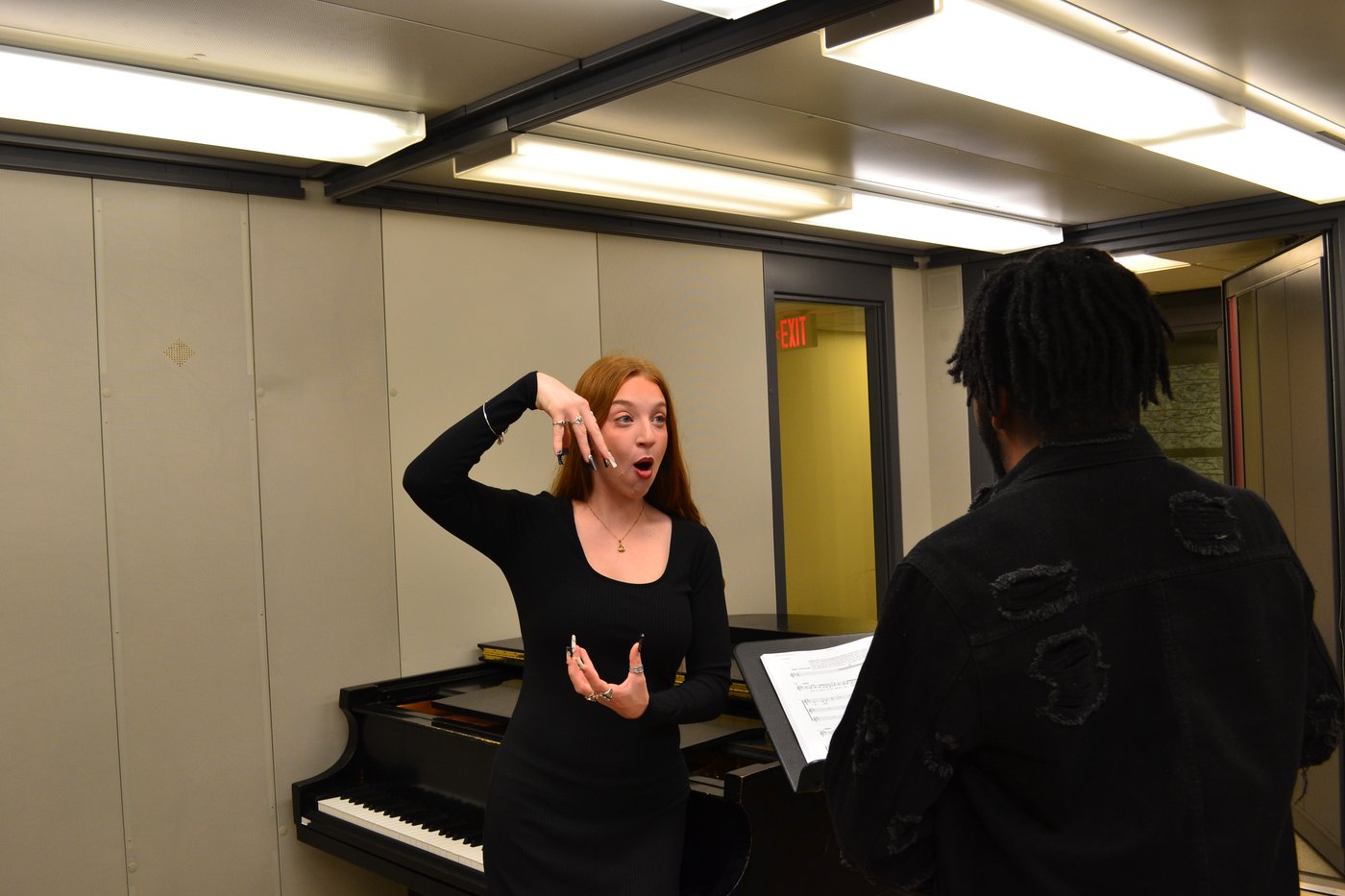 Ana Santiago working one-on-one with a student during a voice lesson